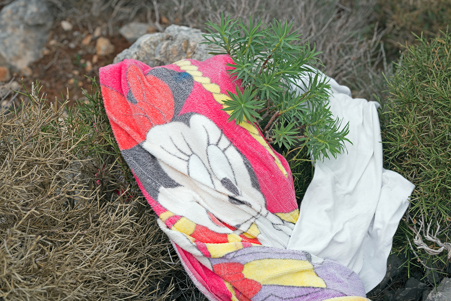 Abandoned towel, half way up a remote hillside.