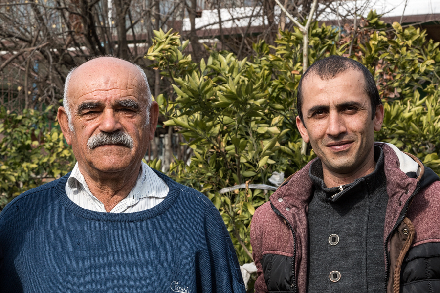 Our driver, Elmar (right) and the kind owner of a citrus grove where snowdrops grew.
