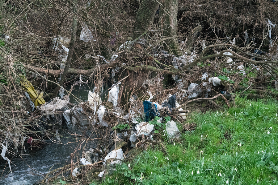 A stream, typically clogged with plastic rubbish, Turkish Thrace.